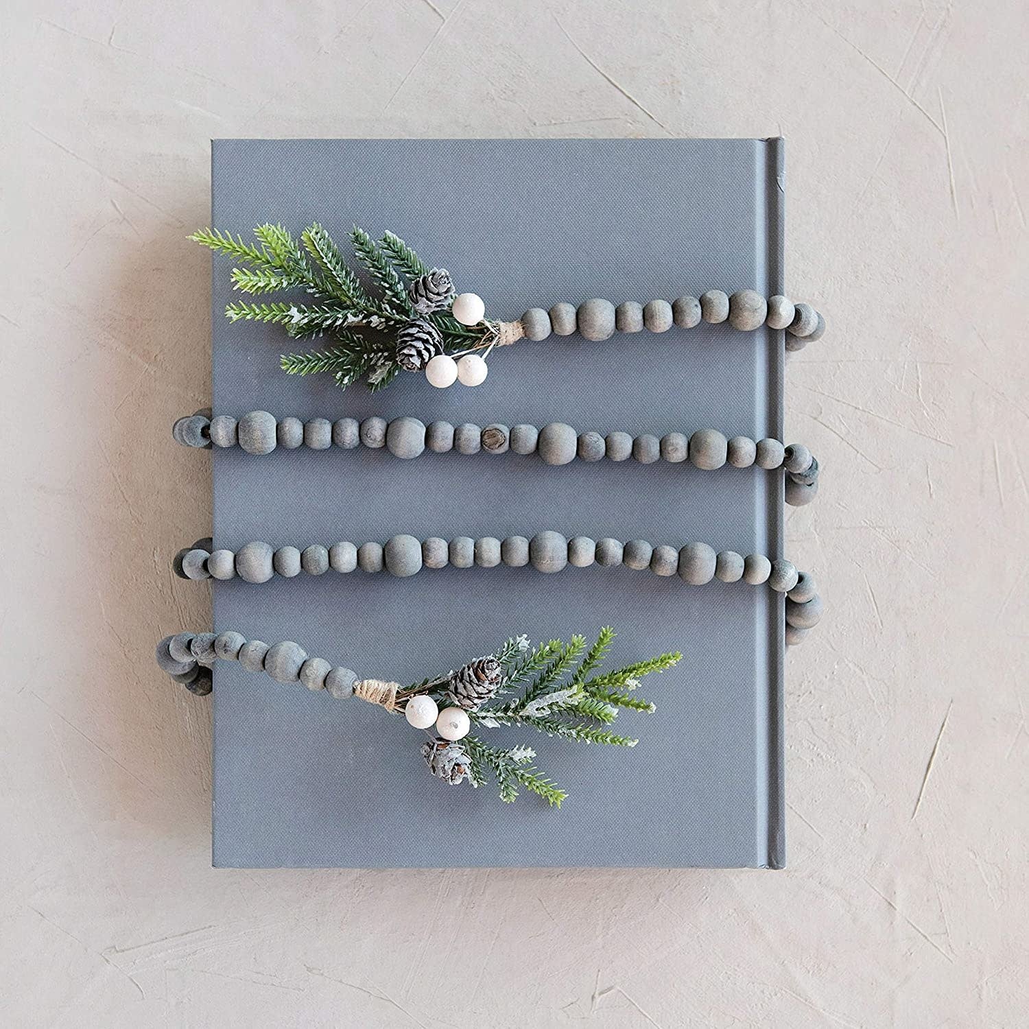 PAULOWNIA WOOD BEAD GARLAND W/ FAUX PINE GREENERY TASSEL, GREY WASH