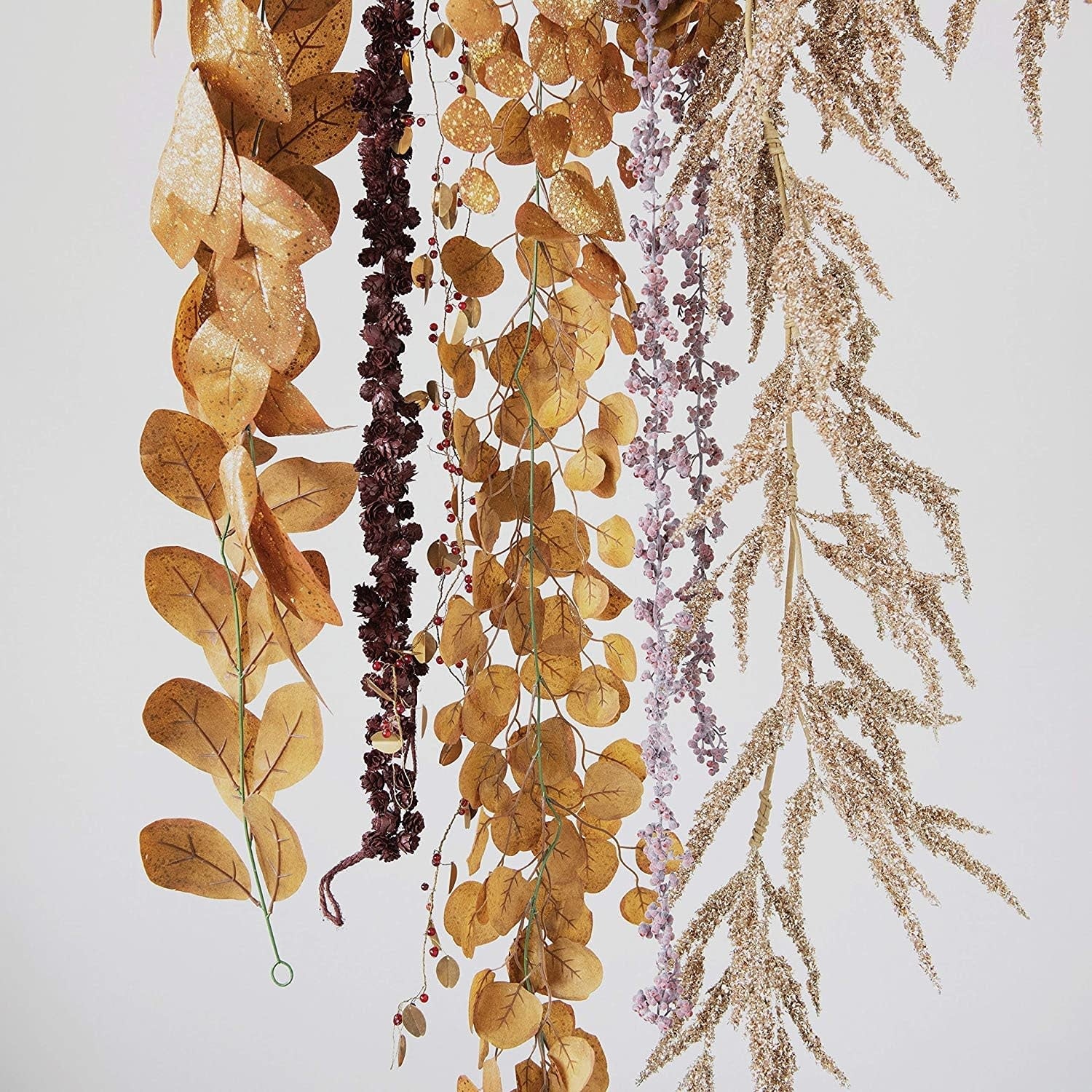FAUX EUCALYPTUS LEAF GARLAND W/ GLITTER, GOLD FINISH
