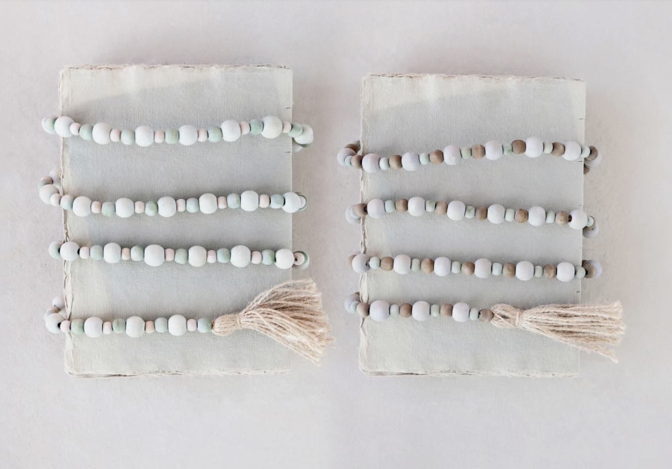 PAULOWNIA WOOD BEAD GARLAND W/ JUTE TASSEL